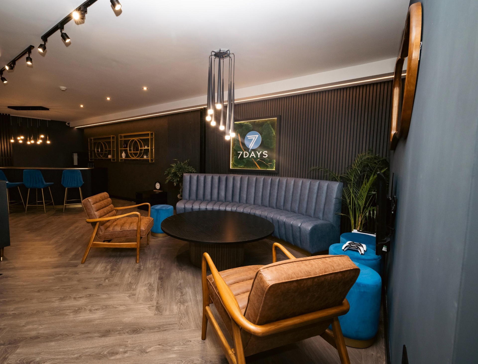 Contract banquette seating in slate velvet with a hospitality lounge fit-out
