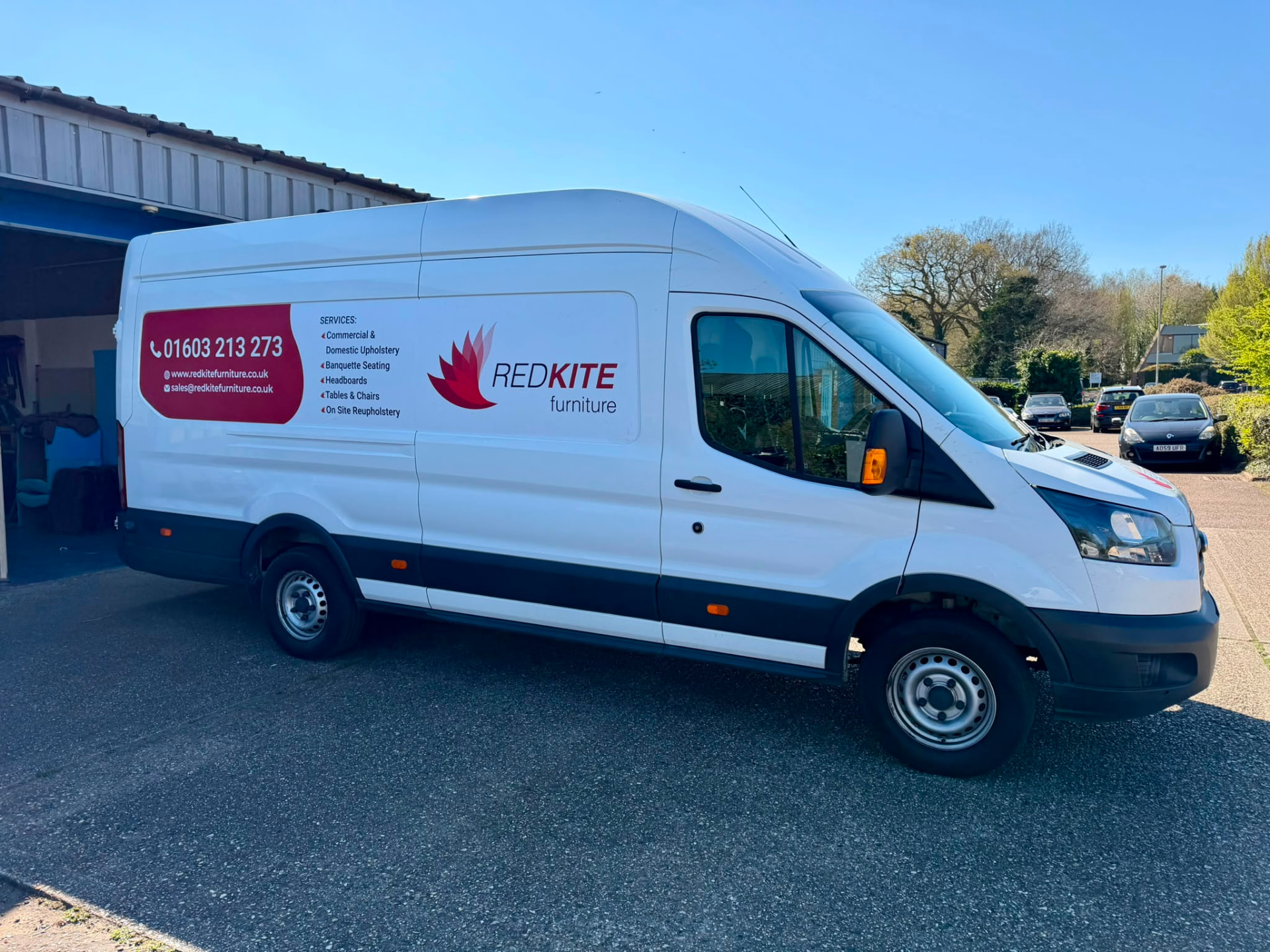 Red Kite Furniture branded Ford Transit van parked outside the Norwich workshop