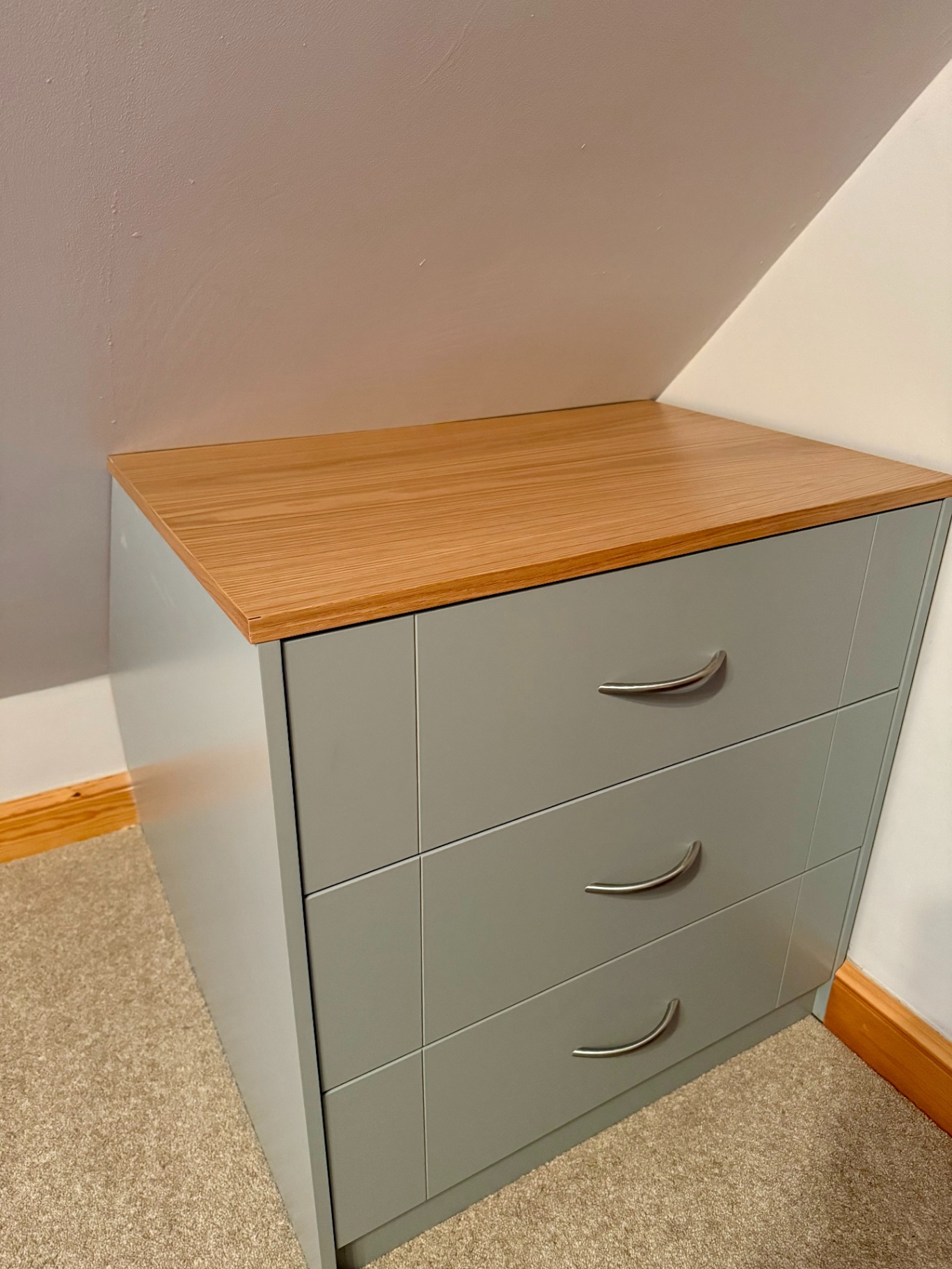 Close-up of a fitted chest showing joinery and drawer detailing